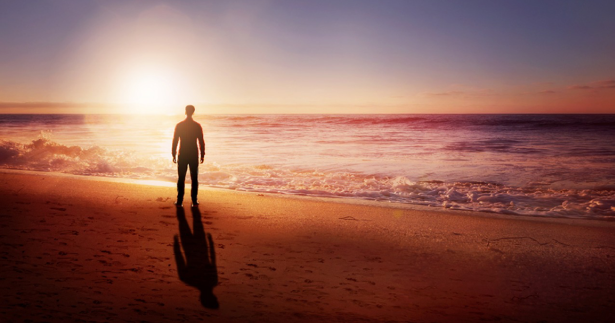 Called to Contemplation man in a beach in his lucid dreaming